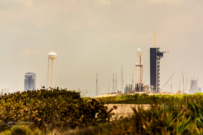 This was taken with my 18-300mm (at 300mm) from the closest spot on the beach you can get to the launch pad, which is 2.73 miles away. You can not watch the launch from here. They clear a mile of beach as a buffer zone before the launch.